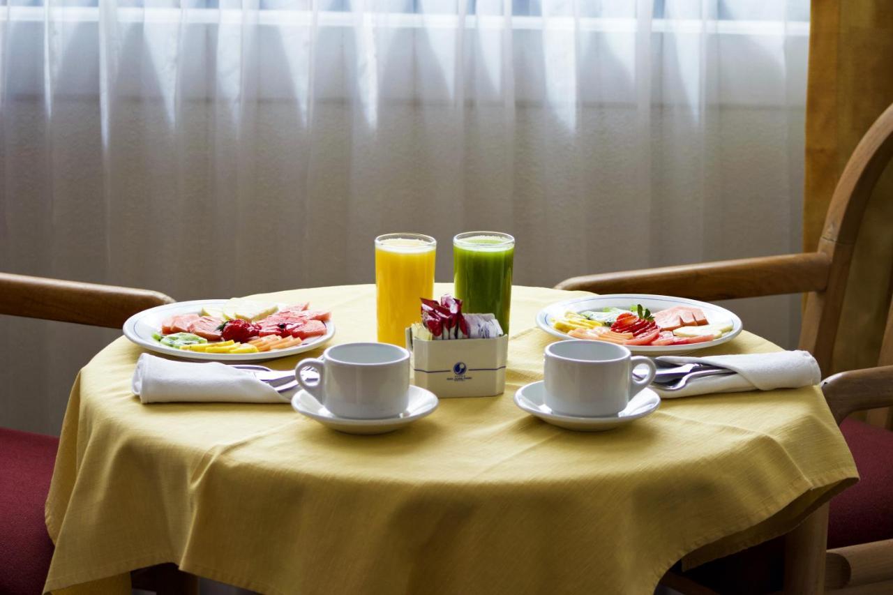 San Juan Park Hotel San Juan del Río Exterior foto A light breakfast